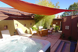 Relax in the outdoor courtyard at New Day Spa